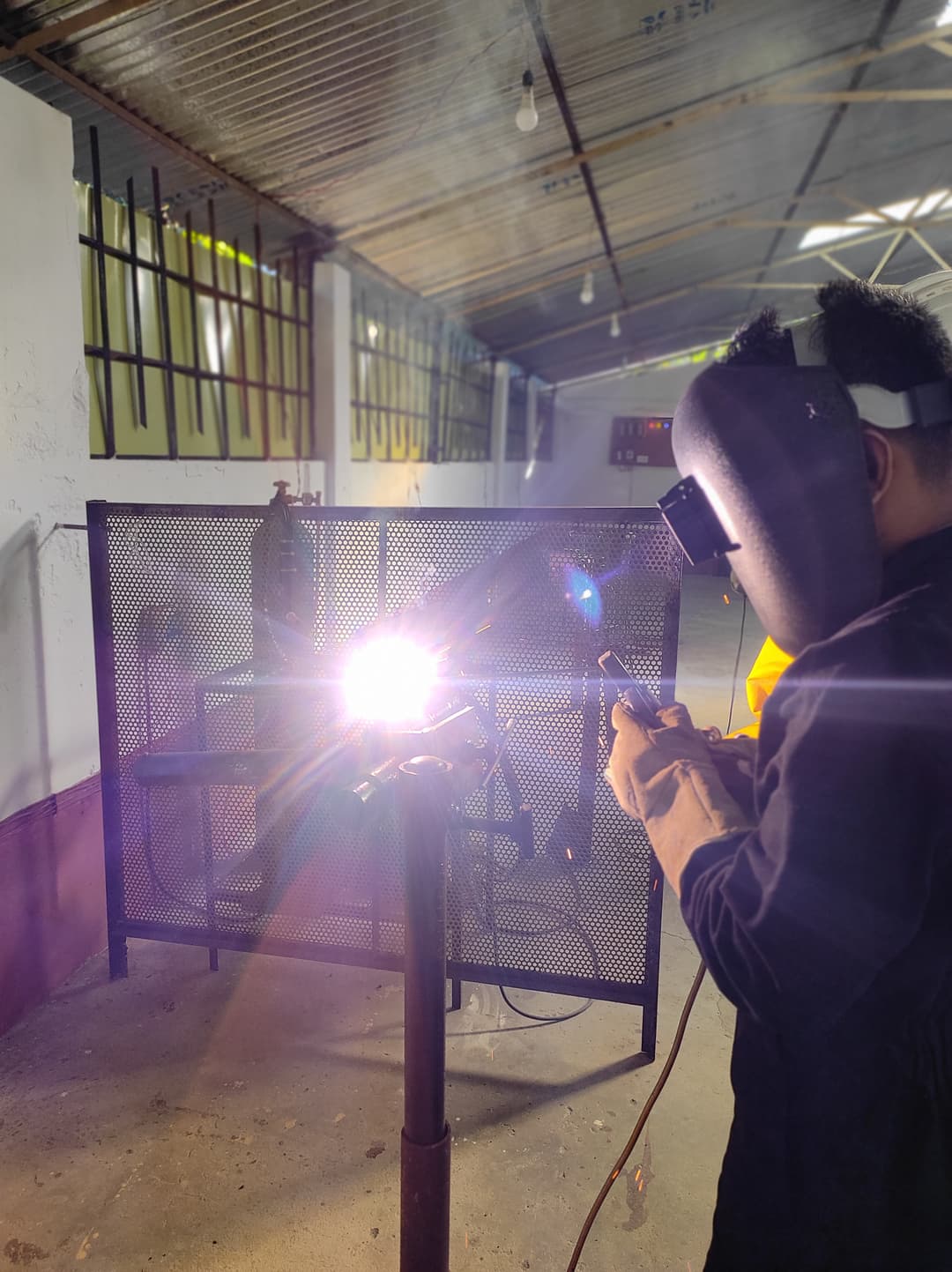 Student welding practice session