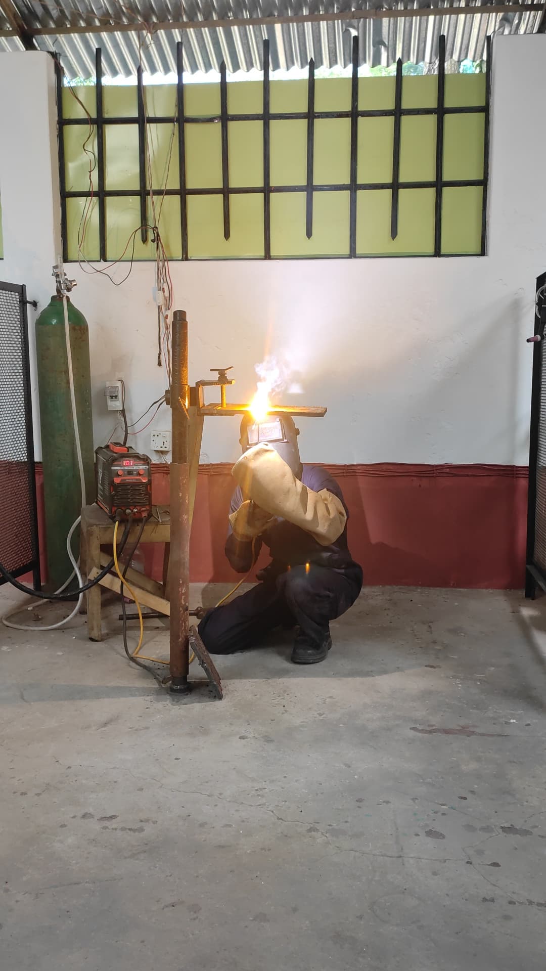 Student working on welding project
